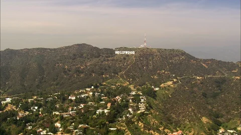 Aerial of Hollywood sign in mountains at Los Angeles, California, United States Stock Footage