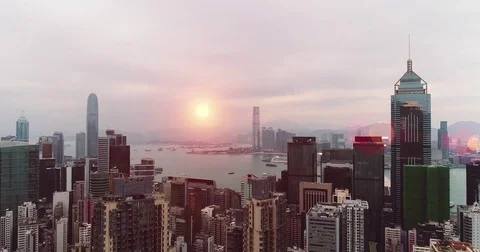 AERIAL. Hong Kong Sunrise, View from The drone, Hong Kong Sun shape in the sky Stock Footage