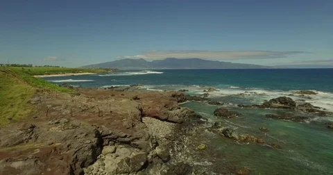 Aerial Hookipa Beach Rocky Point Fly Out Barbed Wire Fence Video stock 78554909