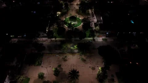Aerial horizontal top down shot of a lighted neighborhood public park and p.. Stock Footage 339252150