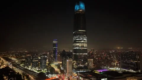Aerial horizontal tracking shot approaching the Costanera Center skyscraper.. Vídeos de archivo 339252130
