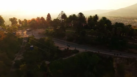 Aerial Horizontal Tracking Shot of San Cristobal Cableway and Mountain Road.. Vídeos de archivo 339254186