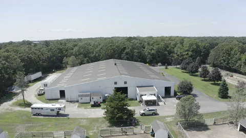Aerial Horse Stable Pullback Shot 4K@24FPS DLOG Video stock 213146381
