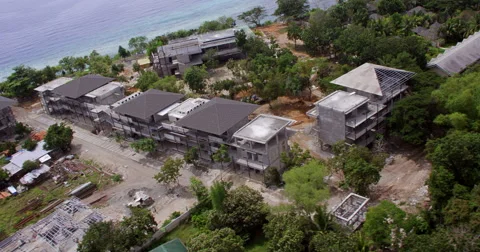 Aerial of hotel developments on a tropical beach front Stock Footage 45806741
