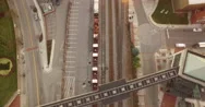 Aerial Of Houses, Bridge And Cargo Train In The City Stock Footage
