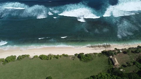 Aerial hover above beach and ocean, Nyang Nyang Beach Bali Stock Footage 328993967