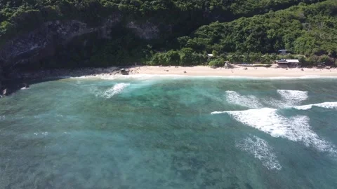 Aerial hover above cliffs and coastline, Nyang Nyang Beach Bali Stock Footage 328993975