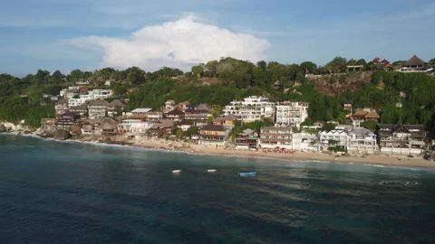 Aerial hover over central coastline at Bingin Beach, Bali Stock Footage 329004556
