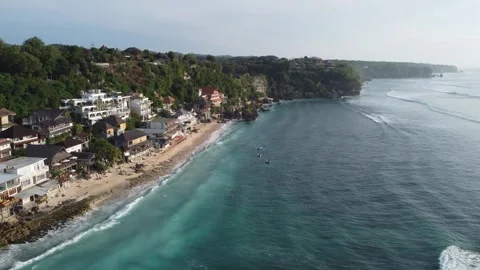 Aerial hover over right coastline at Bingin Beach, Bali Stock Footage 329004909