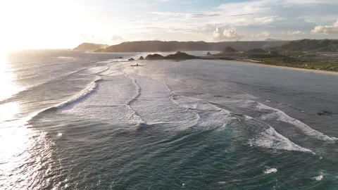 Aerial hover over rolling waves at Bukit Merese, Kuta, Lombok, Indonesia, 4K Stock Footage 346061800