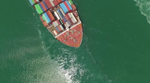 AERIAL: Huge container ship fully loaded with cargo shipping goods Video stock 61440634