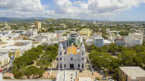 Aerial hyper lapse around town of Ponce in Puerto Rico Stock Footage 98274037