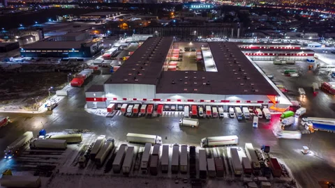 Aerial Hyper lapse (hyperlapse - motion time lapse), logistics park with trucks Stock Footage 169261703