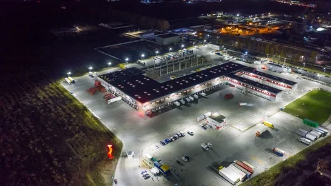 Aerial hyper lapse (hyperlapse - time lapse), view of the large logistics park Stock Footage 123807612