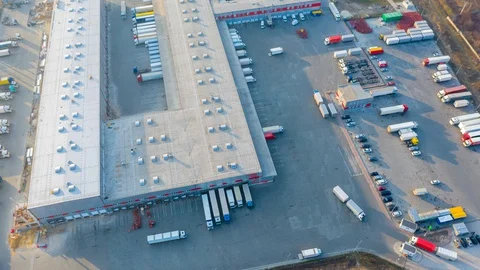 Aerial hyper lapse (hyperlapse - time lapse) of the large logistics park Stock Footage 127797238