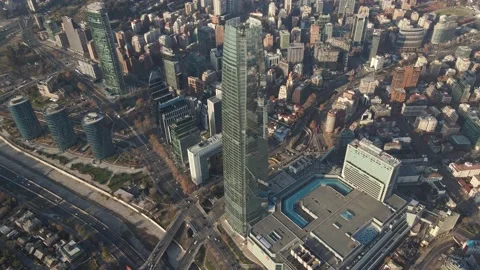 Aerial hyper lapse orbit around tallest building in south america, Santiago de C Stock Footage 136011595