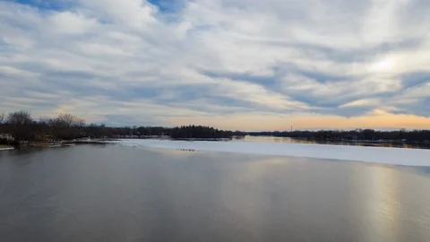 Aerial Hyper-lapse Riverside During Spring Season in Montreal, Canada Stock Footage 106400689