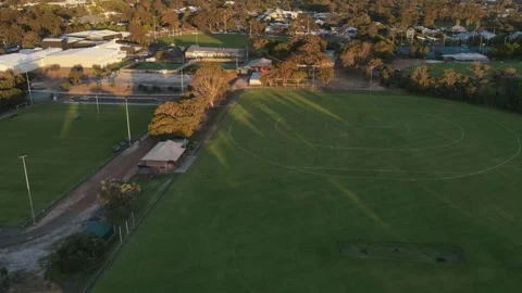 Aerial Hyper lapse of shadows over empty football field at sunset 4K timelaps Vídeo Stock 152457767