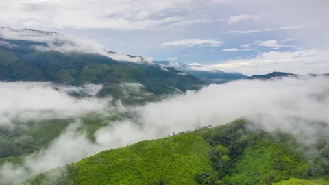 Aerial Hyper lapse Time lapse. Over mountains and covered with dense ground fog  Stock Footage 141523150