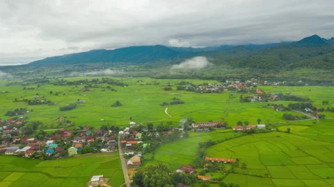 Aerial Hyper lapse Time lapse. Over mountains and covered with dense ground fog  Stock Footage 141523233