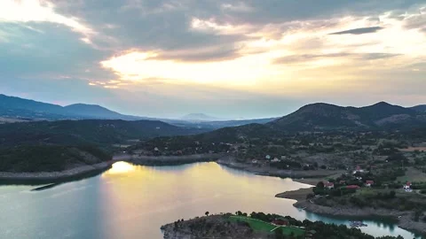 Aerial hyper lapse video of a sunset above lake Stock Footage 132766884