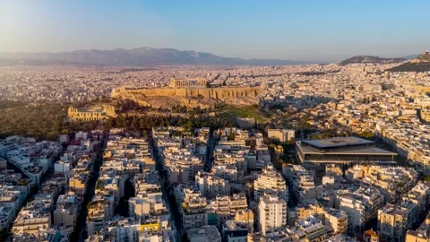 Aerial hyper lapse view of the skyline of Athens in sunset light Stock Footage 320374523