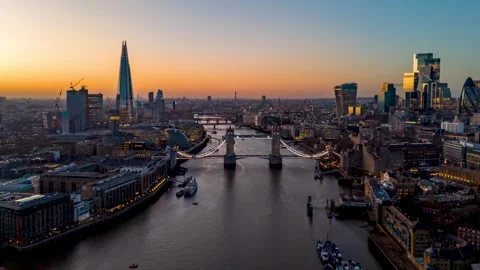 Aerial hyper time lapse view of the Tower Bridge and skyline of London Stock Footage 321136151