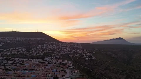 Aerial Hyperlapse 4K - Cumbre del Sol Sunset Benitachell, Alicante Spain 動画素材 335567647