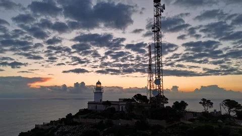 Aerial Hyperlapse 4K - Lighthouse and Tower Silhouette Sunset, Javea Видео 335551013