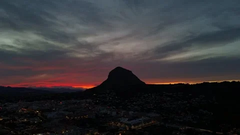Aerial Hyperlapse 4K - Montgó After Sunset Red Sky City Lights, Javea 動画素材 335567897