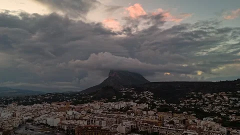 Aerial Hyperlapse 4K - Storm Clouds Over Javea Old Town, Alicante Spain 動画素材 335549644
