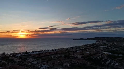 Aerial Hyperlapse 4K - Sunset Javea Beach Cabo San Martin Reflection 動画素材 335549521