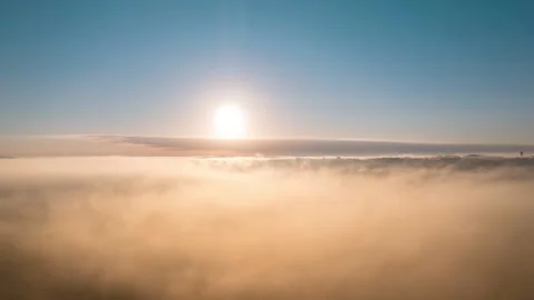 Aerial hyperlapse above the Mist during  sunrise Stock Footage 244970959