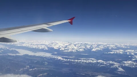 Aerial hyperlapse from airplane over mountain range Stock Footage 122371926