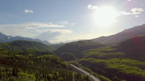 Aerial hyperlapse of Alaskan highway through the mountains Video stock 113534074