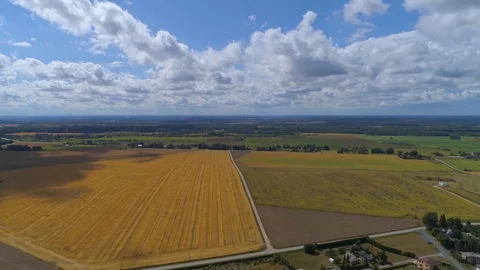 Aerial hyperlapse of approaching clouds and shadows over a crop field Stock Footage 93664459