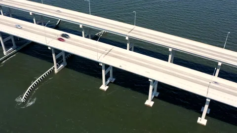 Aerial hyperlapse of bridge over water with highway and traffic 4K Stock-Footage 145669693