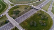 Aerial Hyperlapse Of Busy Highway Junction Roundabout Stock Footage
