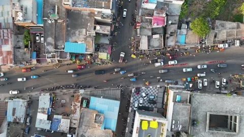 Aerial Hyperlapse of Busy Traffic Intersection and Dense Urban Housing Stock Footage 335988454
