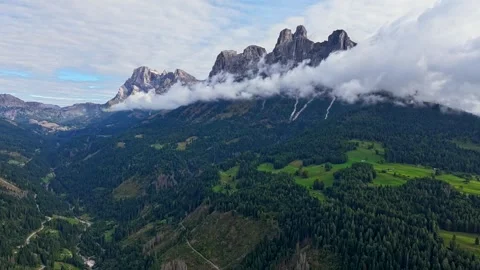 Aerial hyperlapse clouds drift above Pale di San Martino Dolomites Stock Footage 320218083