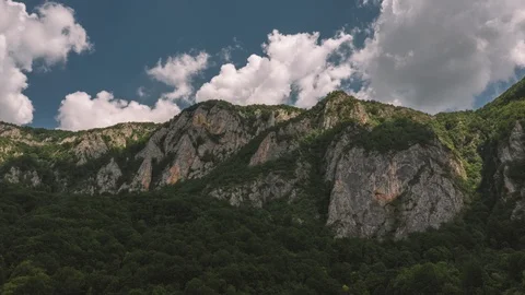 Aerial hyperlapse of clouds forming over mountain ridge Stock Footage 111139070