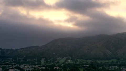 Aerial Hyperlapse of Clouds Moving over a Golf Course in Glendora 스톡 동영상 150775035