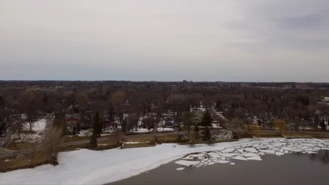 Aerial Hyperlapse of Cloudy Spring Season Riverside in Montreal, Canada Stock Footage 105967712