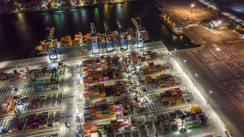 Aerial Hyperlapse Container ships in the harbor with bridges Crane  스톡 동영상 116035460