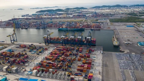Aerial Hyperlapse Container ships in the harbor with bridges Crane  動画素材 116035588