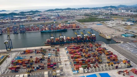 Aerial Hyperlapse Container ships in the harbor with bridges Crane  Stock-Footage 116035813