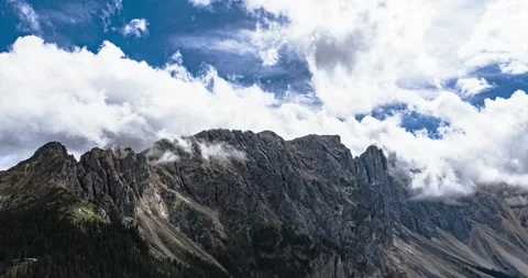 Aerial Hyperlapse of Dolomites Mountains in Val di Fassa, Italy With Dramatic Stock Footage 331577572
