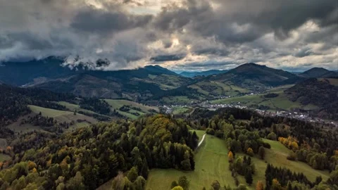 Aerial Hyperlapse of Dramatic Clouds Sky Over Autumn Countryside Landscape Stock Footage 311505310