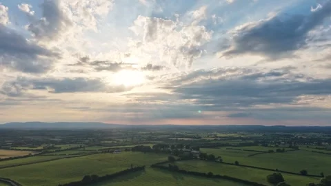 Aerial Hyperlapse of Dramatic Cloudscape Over Rural Farmland Stockbeeldmateriaal 337456570