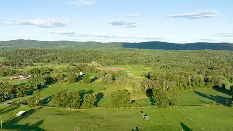 Aerial Hyperlapse Floating over Lush Green New England Valley 動画素材 250481380